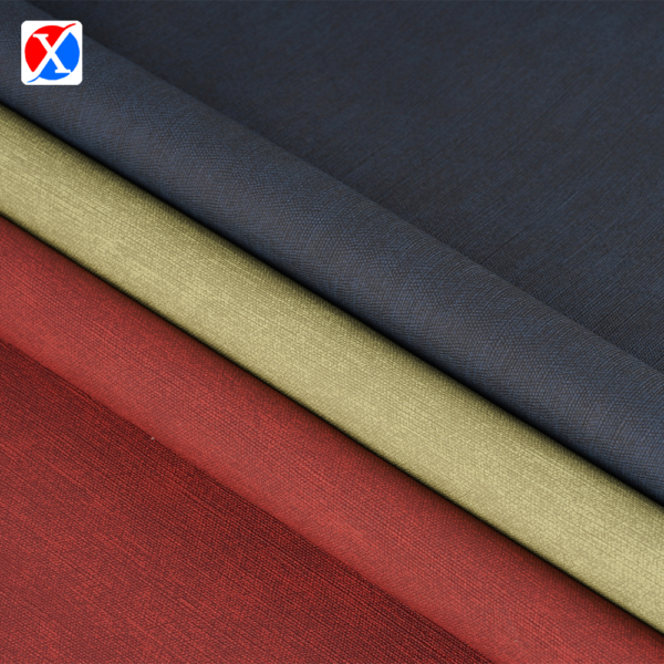 Brown textured PVC upholstery leather showing the surface and soft backing