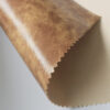 XZ60037 distressed PVC leather with mesh backing (1) XZ60037 PVC leather with mesh fabric backing
