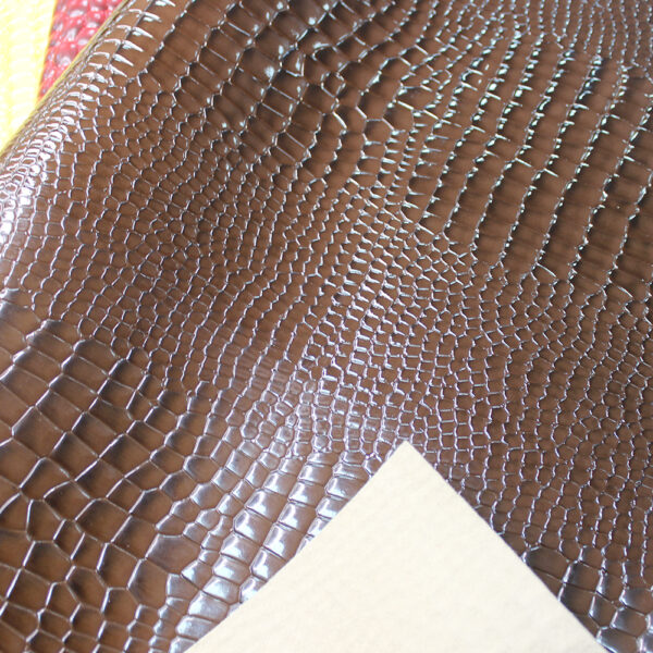 double-needle brushed fabric backing of stone grain PVC leather