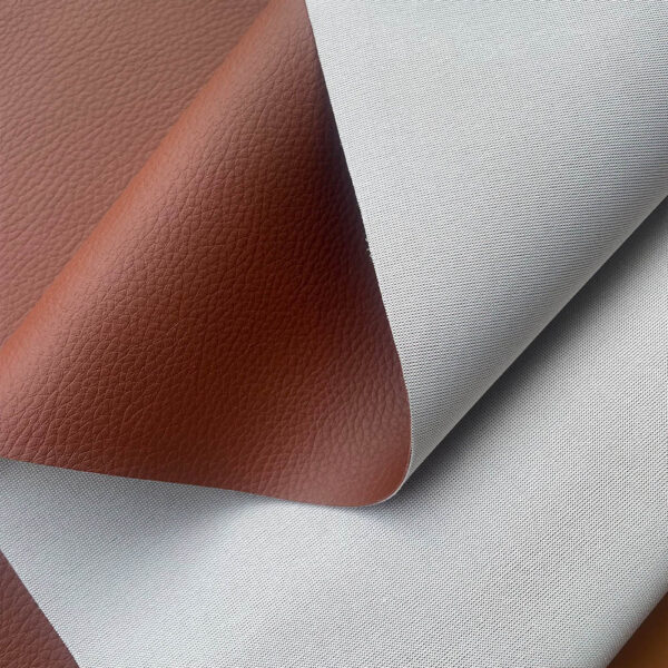 XZ73463 fine pebble grain PVC leather with white fabric backing for motorcycle seats (3) XZ73463 PVC leather with white single-sided fabric backing