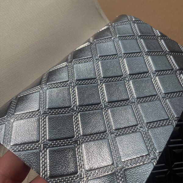 XZ73485 square grid embossed PVC leather with knitted fabric backing for motorcycle seats (1) square grid PVC motorcycle seat leather texture