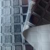 XZ73485 square grid embossed PVC leather with knitted fabric backing for motorcycle seats (3) XZ73485 square grid embossed PVC leather for motorcycle seats