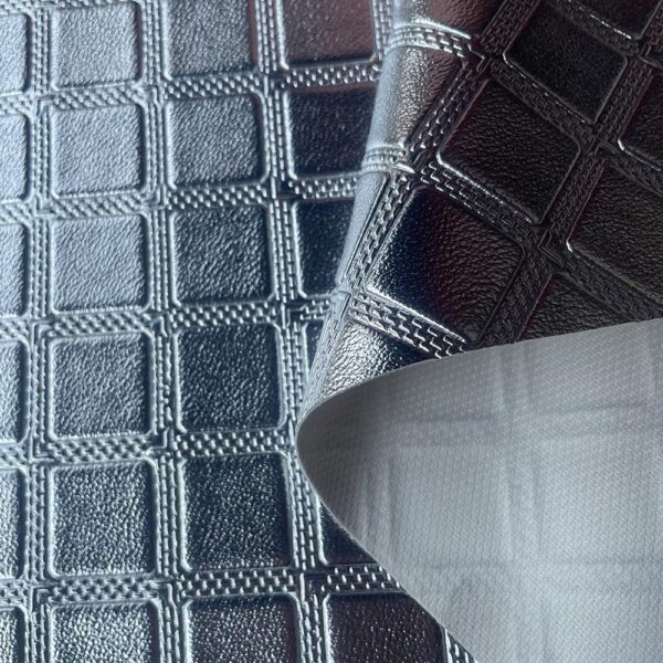 XZ73485 square grid embossed PVC leather with knitted fabric backing for motorcycle seats (3) XZ73485 square grid embossed PVC leather for motorcycle seats